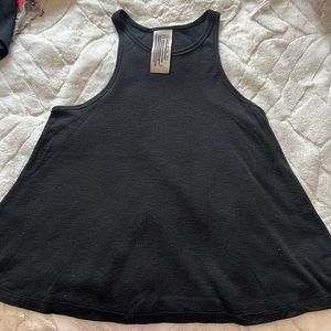 Free People flowy tank top in Black, size Small